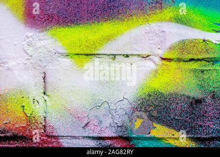Frammento di graffiti colorati dipinta su un muro di mattoni. Texture. Sfondo astratti per la progettazione. Foto Stock