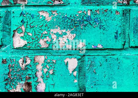 Frammento di graffiti colorati dipinta su un muro di mattoni. Texture. Sfondo astratti per la progettazione. Peeling vernice di colore. Foto Stock