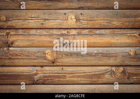 Vintage di tavole di legno. Grunge parete in legno, pattern di recinzione. Il vecchio legno marrone scuro dello sfondo. Tabella retrò. Listoni marrone dello sfondo. Rustico di legno grano t Foto Stock