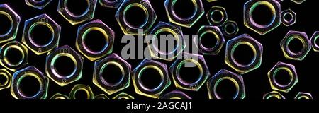 Panoramica di sparse in grandi e piccoli dadi in metallo isolato su nero Foto Stock