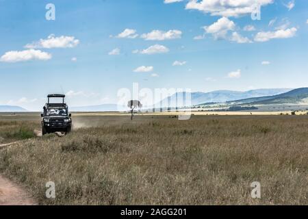 Un carrello in Masai Mara Plains Foto Stock