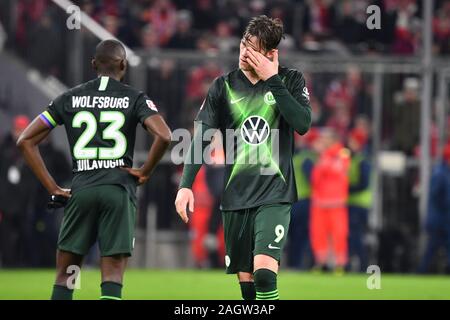 Monaco di Baviera, Germania. Xxi Dec, 2019. Wout WEGHORST (VFL Wolfsburg), delusione, frustrato deluso, frustratedriert, sconsolato, azione. Soccer 1.Bundesliga, XVII Giornata giornata17, FC Bayern Monaco di Baviera (M) - VFL Wolfsburg 2-0, (WOB), il 21 dicembre 2019 in Muenchen ALLIANZARENA, DFL REGOLAMENTI VIETANO QUALSIASI USO DI FOTOGRAFIE come sequenze di immagini e/o quasi-VIDEO. | Utilizzo di credito in tutto il mondo: dpa picture alliance/Alamy Live News Foto Stock