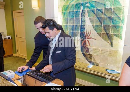 Miami Florida,Biscayne Boulevard,Hilton Miami Downtown,hotel hotel hotel alloggio motel,reception check in reception prenotazioni re Foto Stock