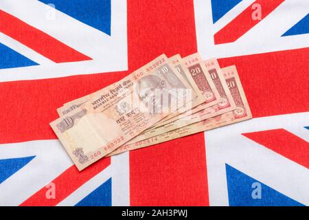 Il vecchio stile indiano rupia 20 banconote / bill & Union Jack. Per l'India Rupee tasso di cambio, India economia, India esportazioni britanniche, India UK bilancia dei pagamenti. Foto Stock