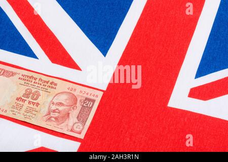 Il vecchio stile indiano rupia 20 banconote / bill & Union Jack. Per l'India Rupee tasso di cambio, India economia, India esportazioni britanniche, India UK bilancia dei pagamenti. Foto Stock