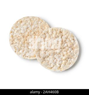 Coppia di intero round cracker di riso isolato su sfondo bianco Foto Stock