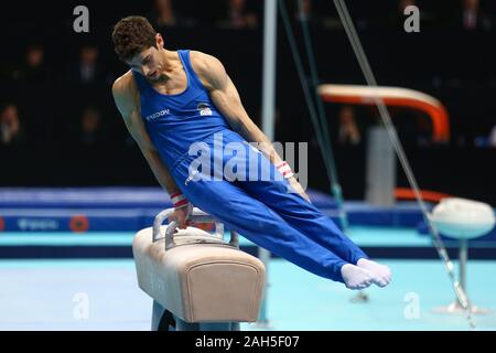 Szczecin, Polonia, 10 Aprile 2019: Ludovico Edalli dell Italia compete sul cavallo durante l'Unione dei campionati di ginnastica Foto Stock