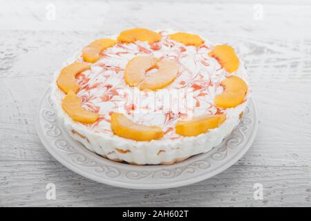 Pesca e yogurt torta Foto Stock