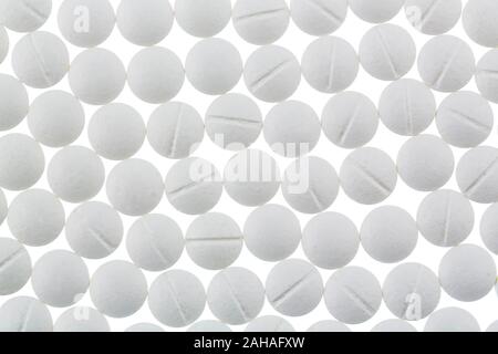 Verschiedene weisse Tabletten, Kosten, Geld, Euro, Dollaro USA,Gesundheitswesen, Krankenhasse, Medizin, Pillen, Foto Stock