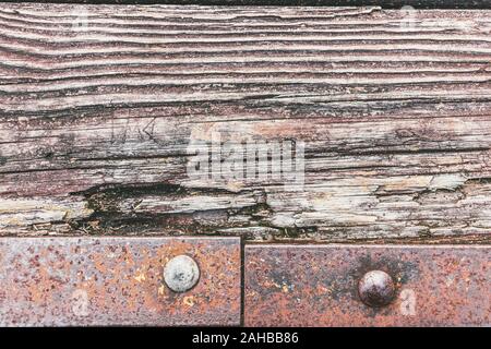 Il legno vecchio e arrugginito carrello metallico texture di sfondo Foto Stock