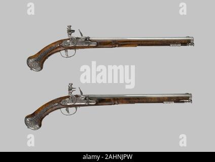 Lazzarino Cominazzo. Coppia di custodia Flintlock Pistols. 1650-1680. L'Italia. Radice di edera, ottone e acciaio Foto Stock