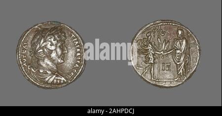 Antico romano. Tetradrachm (moneta) raffigurante l'imperatore Adriano. 131 annuncio. Alessandria. Miliardo il bene gli imperatori si sono dedicati al benessere del popolo, ma come il retro delle loro monete indicare, ogni righello aveva la propria comprensione di ciò che ha reso il buon governo.Sebbene nelle sue satire di Giovenale chided chi è al potere per il dumping il popolino con "pane e circo", l'alimentazione delle persone interessate tutti gli imperatori. Poiché l'Italia non poteva più alimentazione in sé, righelli dipendeva dal grano-crescente province di Egitto e Africa per la fornitura di prodotti alimentari. In questa moneta, una figura che rappresenta la città di Alex Foto Stock