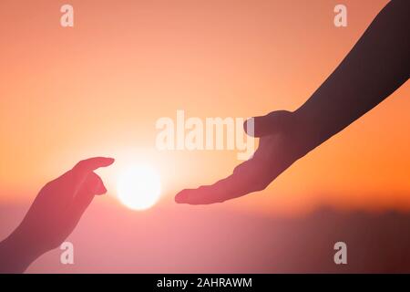 mano di aiuto Foto Stock