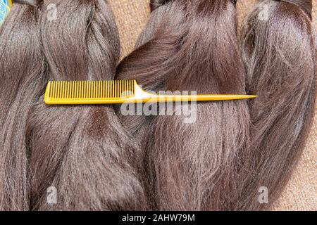 Le estensioni di capelli da utilizzare per fare le trecce Foto Stock