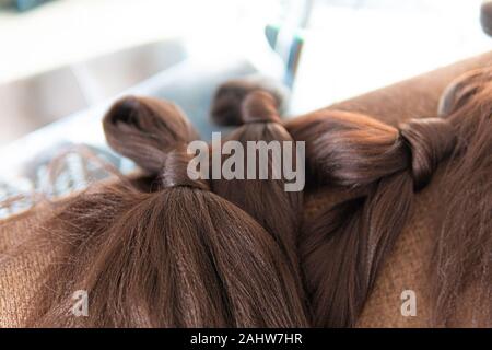 Le estensioni di capelli da utilizzare per fare le trecce Foto Stock