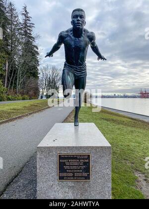 Statua della pista olimpica e il campo runner Harry Winston Jerome (1940-1982), British Columbia atleta del secolo 1871-1971, a Stanley Park, Vanco Foto Stock