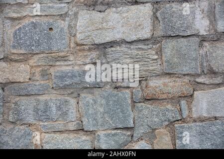 Frammento di un vecchio muro di pietra Foto Stock