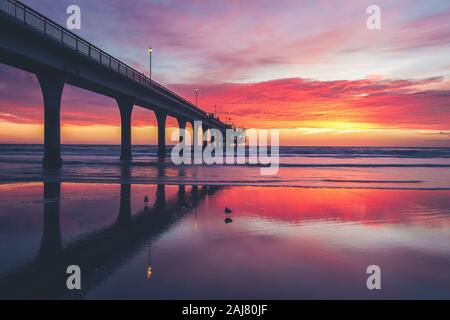 Sunrise a New Brighton Pier, Christchurch, Nuova Zelanda Foto Stock
