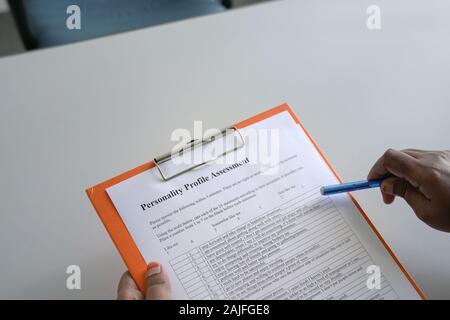 Job ricorrente il riempimento della personalità di valutazione del profilo Foto Stock