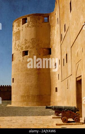 Il Forte Jabrin con cannoni in Oman Foto Stock