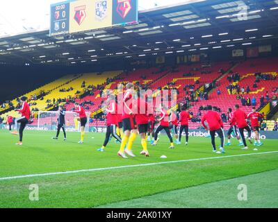 Watford i giocatori in fase di riscaldamento prima della FA cup gioco vs Tranmere Rovers Foto Stock