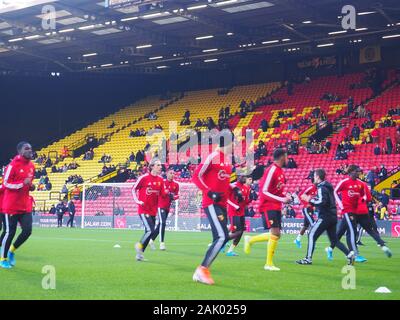 Watford i giocatori in fase di riscaldamento prima della FA cup gioco vs Tranmere Rovers Foto Stock