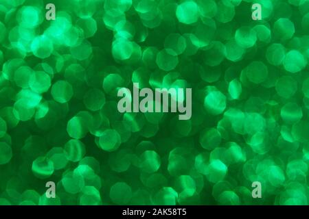 Verde di Natale la sfocatura bokeh texture, glitter texture il giorno di san valentino sfondo. Foto Stock