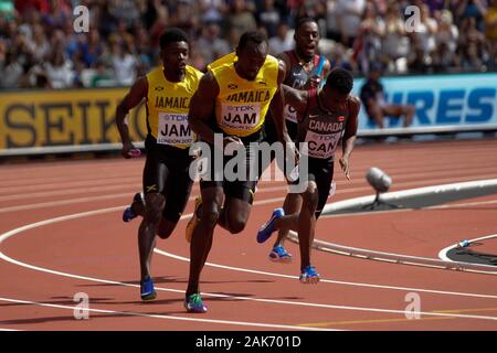 Micheal Campbell e Usain Bolt (Jamaique) durante la seconda riscalda 4x100m uomini relè presso la IAAF mondiale di atletica il 6 agosto, 201st presso lo stadio olimpico di Londra, Gran Bretagna Photo Laurent Lairys / DPPI Foto Stock