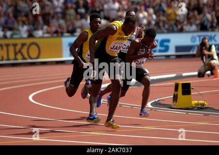 Micheal Campbell e Usain Bolt (Jamaique) durante la seconda riscalda 4x100m uomini relè presso la IAAF mondiale di atletica il 6 agosto, 201st presso lo stadio olimpico di Londra, Gran Bretagna Photo Laurent Lairys / DPPI Foto Stock