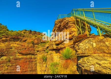 Scalinata che conduce al pulpito Rock lookout famoso punto di riferimento nelle Blue Mountains National Park, New South Wales, Australia. Roccia Arenaria e cliff rock Foto Stock