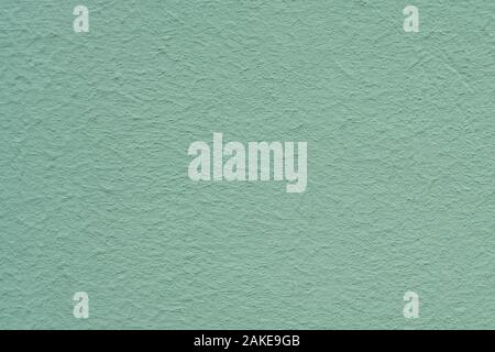 Verde smeraldo dipinti a muro in stucco. Texture di sfondo Foto Stock