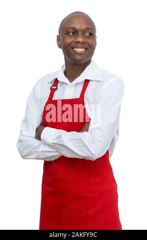 African American cameriere con grembiule rosso isolato su sfondo bianco per tagliare Foto Stock