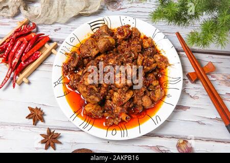 Sauté di pollo tagliato a dadini con Peperoncino Foto Stock