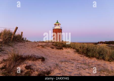 Croce Kampen luce a Sylt Island al crepuscolo Foto Stock