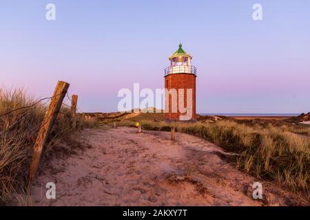 Croce Kampen luce a Sylt Island al crepuscolo Foto Stock