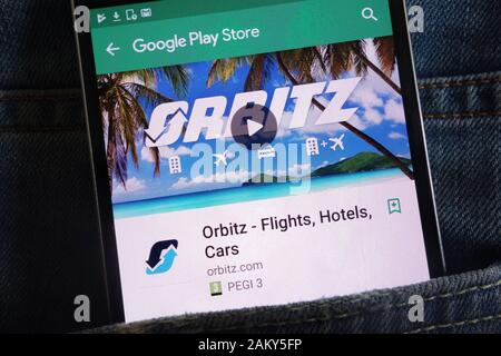 Orbitz app su Google Play Store sito web visualizzato sullo smartphone nascosto nella tasca dei jeans Foto Stock