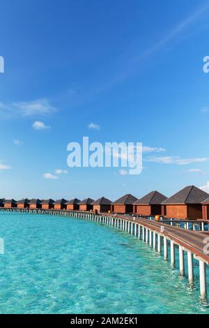 Le Ville Overwater a Olhuveli Beach and Spa Resort South Male Atoll, Kaafu Atoll, Maldive Foto Stock