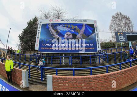 12th gennaio 2020, Headingley Carnegie Stadium, Leeds, Inghilterra; Jamie Jones-Buchanan, Rob Burrow Testimonial, Leeds Rhinoos / Bradford Bulls : un grande schermo lcd che visualizza "Donate to Rob's fund now’ https://uk.virginmoneygiving.com/fund/robburrow Credit: Mark Cosgrove/News Images Foto Stock