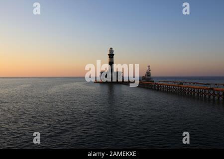 Faro della scogliera Daedalus iat tramonto Foto Stock