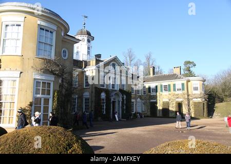 Polesden Lacey casa, faccia orientale, contro un cielo invernale, esterno, Great Bookham, Surrey, gennaio 2020 Foto Stock