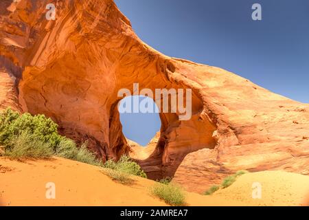 Orecchio dell'arco del vento, Monument Valley Foto Stock