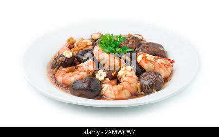 Mescolare funghi fritti shitake con gamberi in salsa Oyster Asian Food stile fusion cinese decorare Vista laterale aglio Intagliato Foto Stock