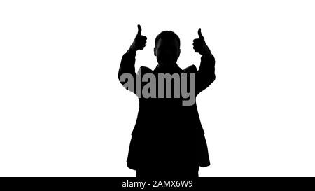Felice silhouette uomo d'affari che mostra pollici, successo, grande successo Foto Stock