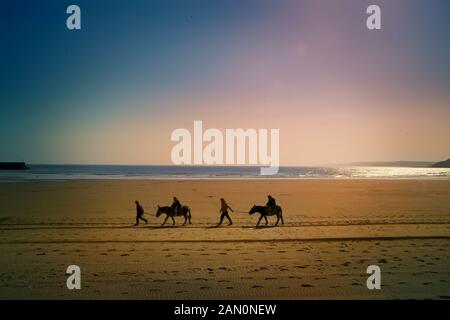 Giro in asino sulla spiaggia di South Bay, Scarborough Foto Stock