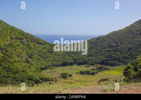 Reserva Florestal de Recreio do Monte Brasil. Vista sul verde dei talloni. Terceira, Azzorre Portogallo. Foto Stock
