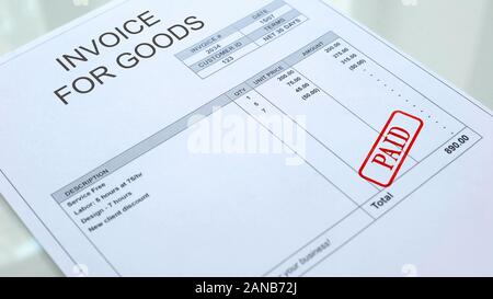 Versate la guarnizione stampigliato sulla fattura per merci documento, documenti commerciali, economia Foto Stock