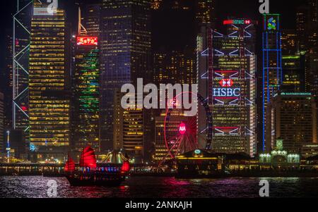 HSBC Hong Kong edificio con altri in Hong Kong Waterfront. Hong Kong Cityscape. Skyline di Hong Kong. Di Hong Kong di notte. Foto Stock