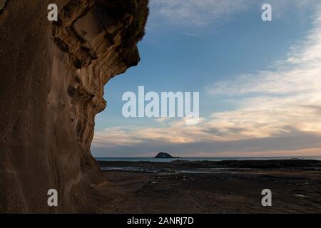 Muriwai spiaggia al tramonto Foto Stock