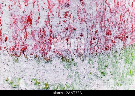 La texture a scacchi di gesso con gocce con colori rosso e verde. Sfondo. Foto Stock