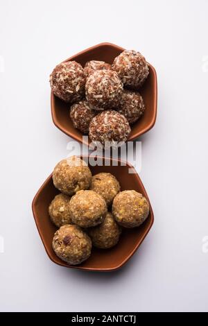 Gruppo di Dink, Gond , Aliv, Halim laddu, Laddoo, Ladu, Ladoo fatto con semi di grezza da giardino e gomma commestibile, cibo dolce Foto Stock